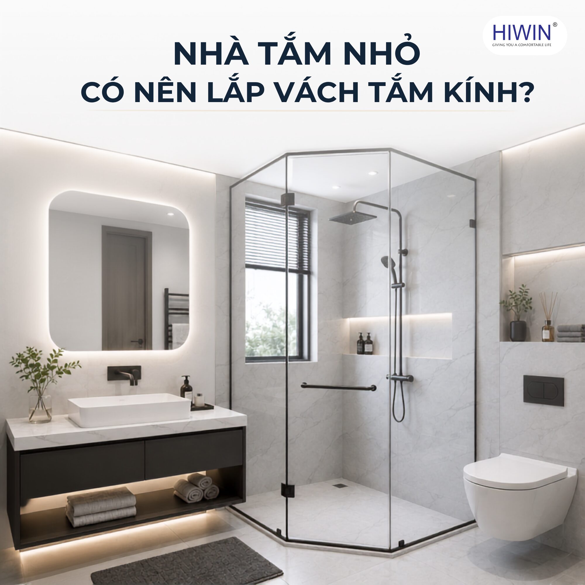 Không gian nhà tắm nhỏ được lắp vách tắm kính để phân chia khu khô và khu ướt